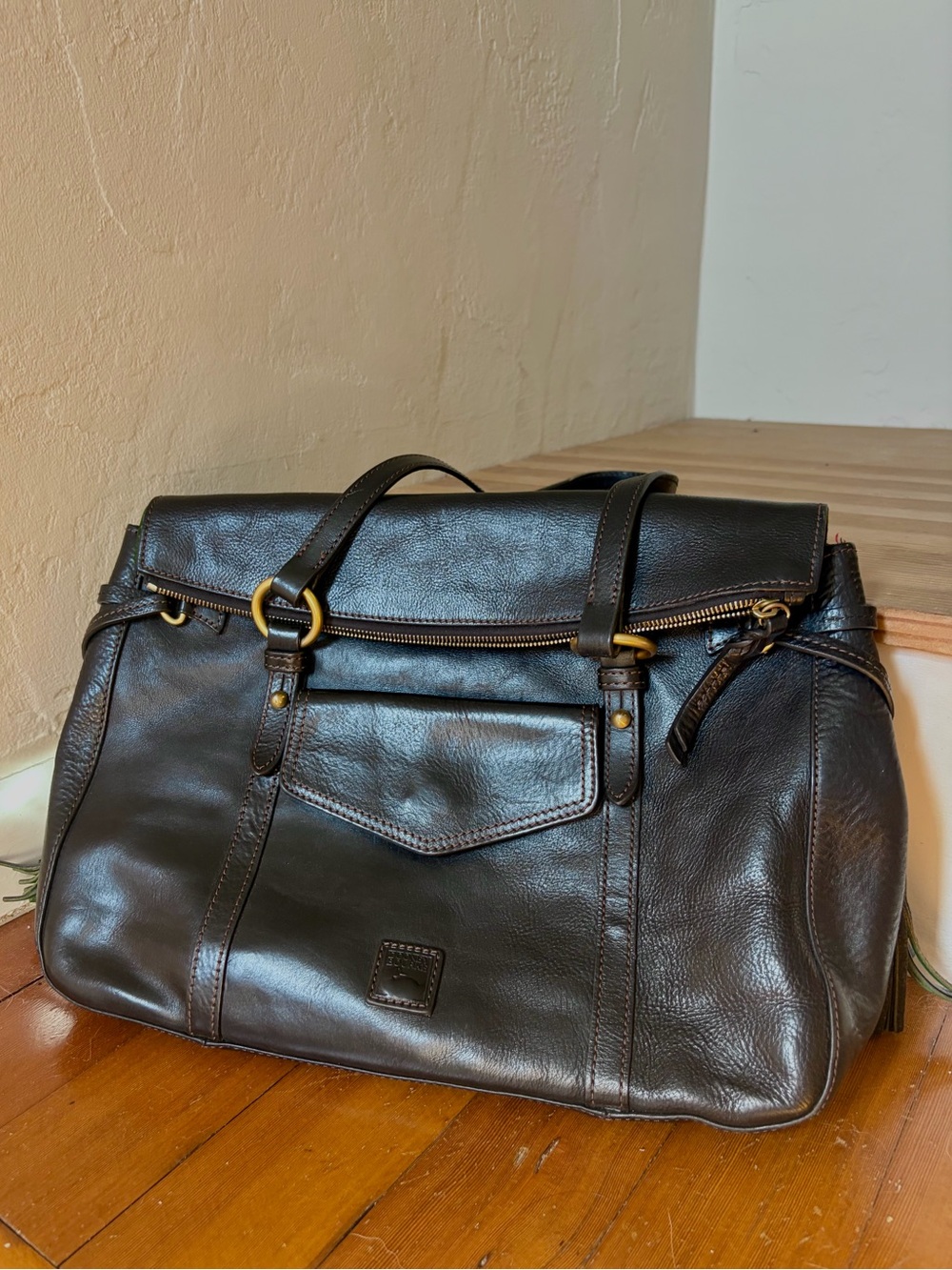 Dooney & Bourke Florentine Leather Satchel in Black with Gold-Tone Hardware.
